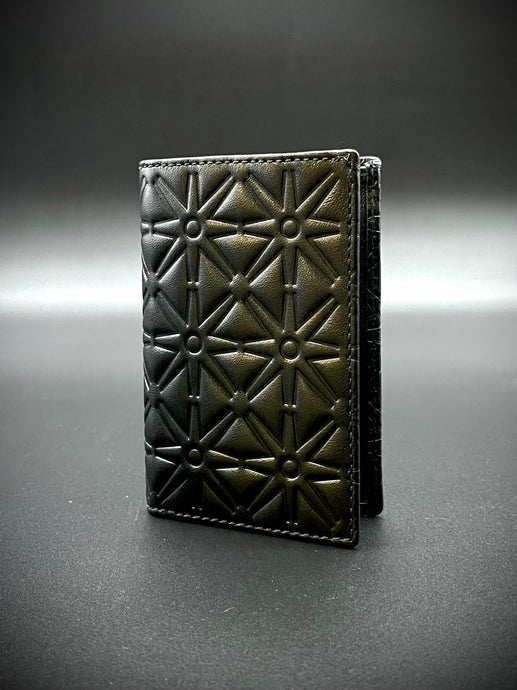 Comme des Garçons embossed card holder