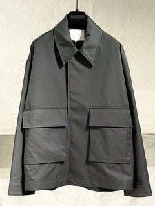Studio Nicholson coated cotton jacket