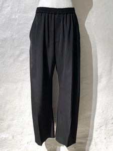 Maison Margiela MM6 curved leg trousers