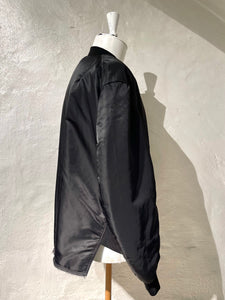 Comme des Garçons BLACK twisted reversible bomber jacket