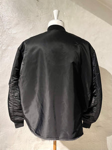 Comme des Garçons BLACK twisted reversible bomber jacket
